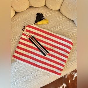 Red and white striped canvas clutch